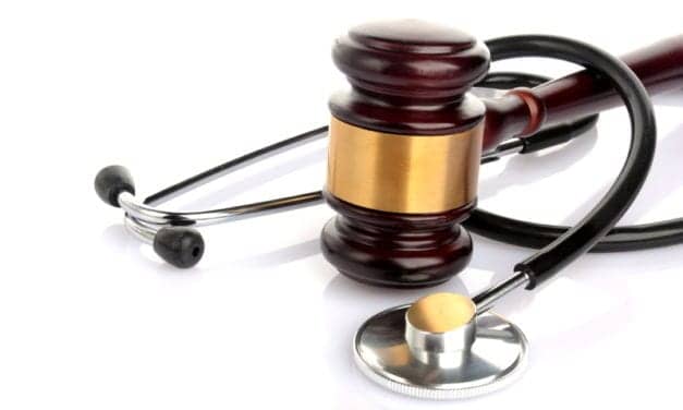Lab Worker Who Had Long-Term COVID is Suing Hospital, Says She Was Fired for Illness