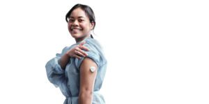 woman wearing Nutromics DNA-based sensors on arm